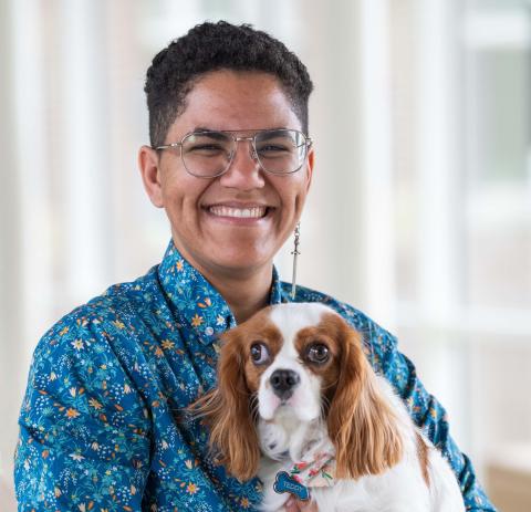 Gabby Fuller holding dog